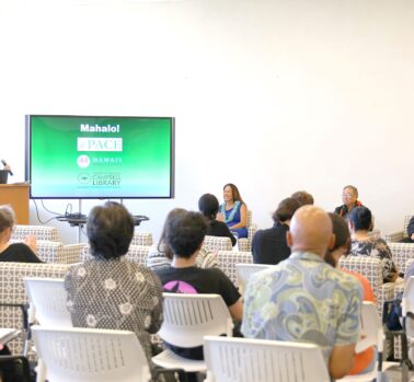 A panel speaks at an event entitled, 
